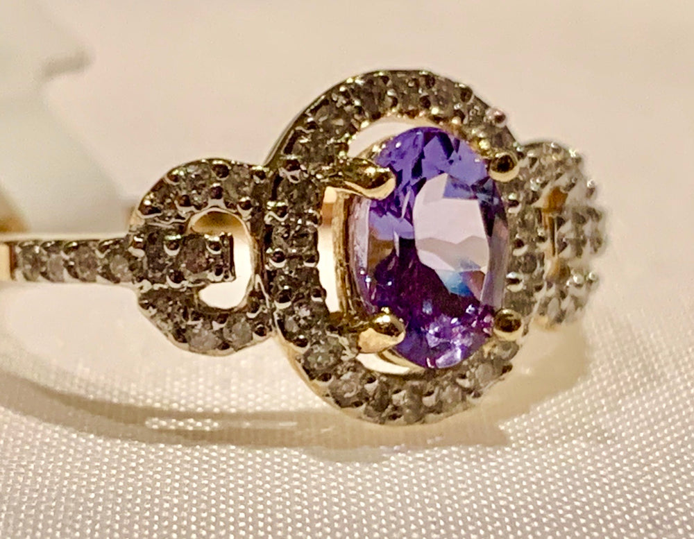 14K YELLOW GOLD TANZANITE AND DIAMOND RING